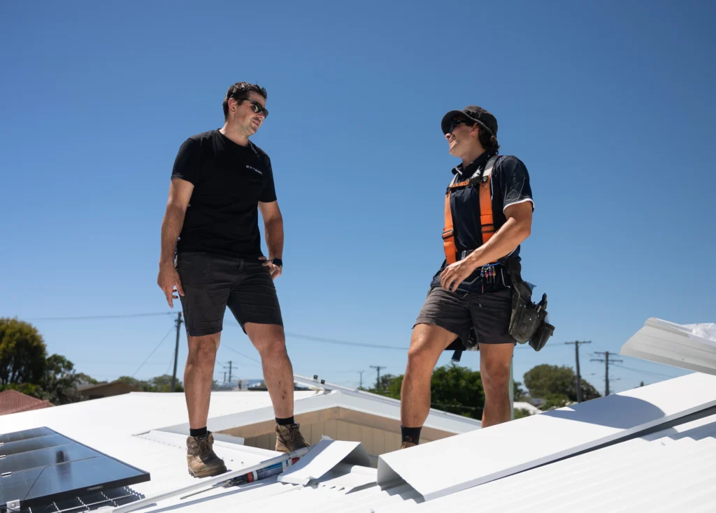 Bozcon Construct builders on a rooftop during a home extension project at Golden Beach, Sunshine Coast
