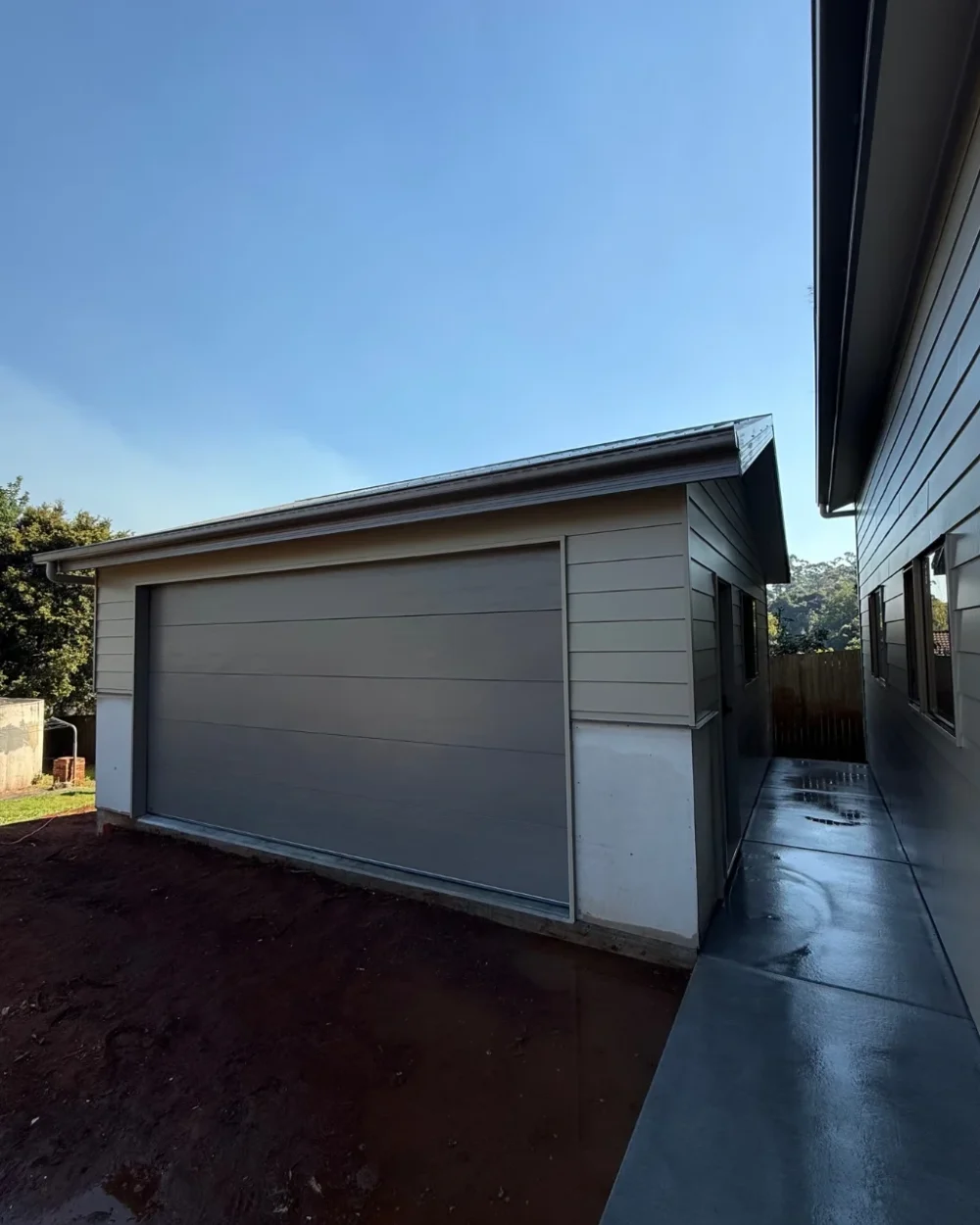 newly-built-garage-concrete-path